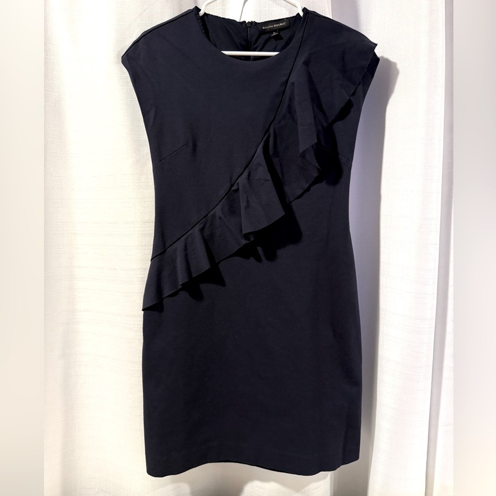 Knee length dress with ruffles